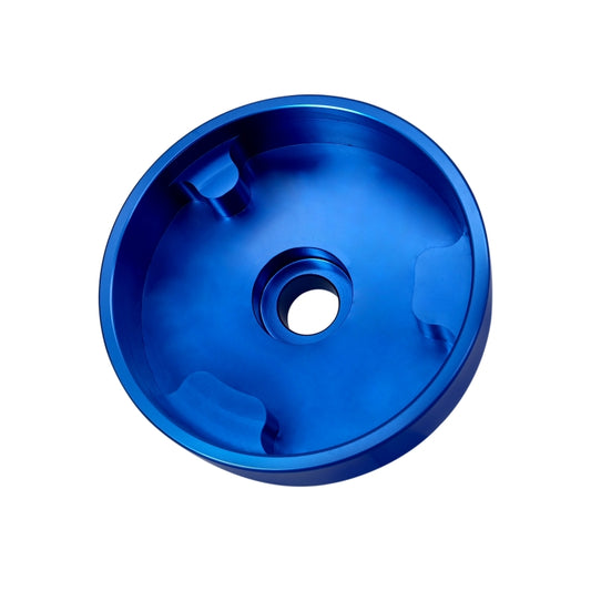 Blue timing tool faceplate with central hole and recessed grooves