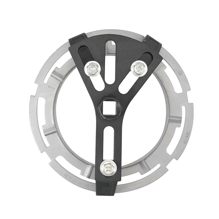 Universal fuel pump removal tool with circular metal insert and black brackets
