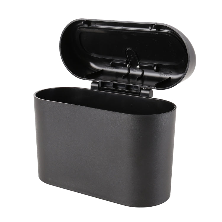 Car trash can bin with flip-open lid, empty interior compartment