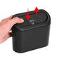 Car trash can bin lid showing press points for opening