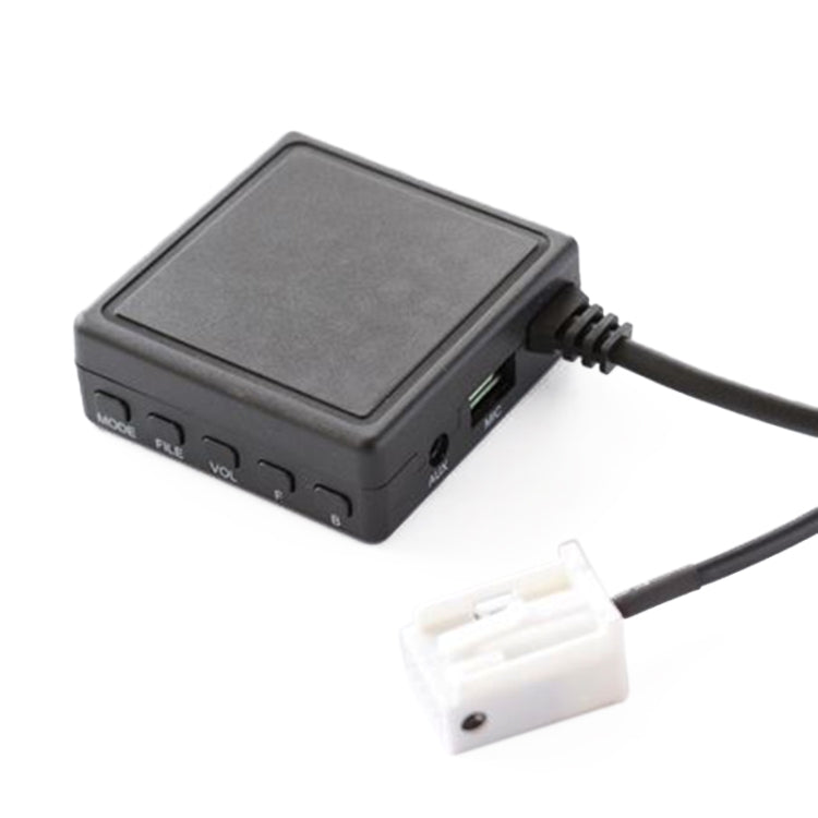 Car music player module with side ports and wiring harness connector cable