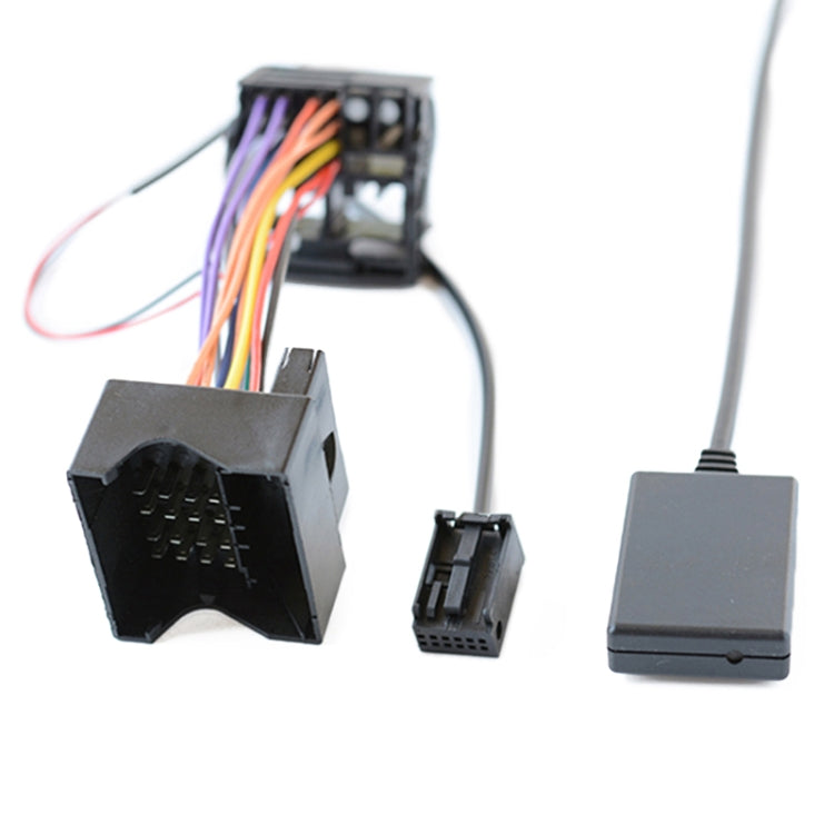 Car AUX Bluetooth audio cable with microphone, close-up of wiring harness and plug ends