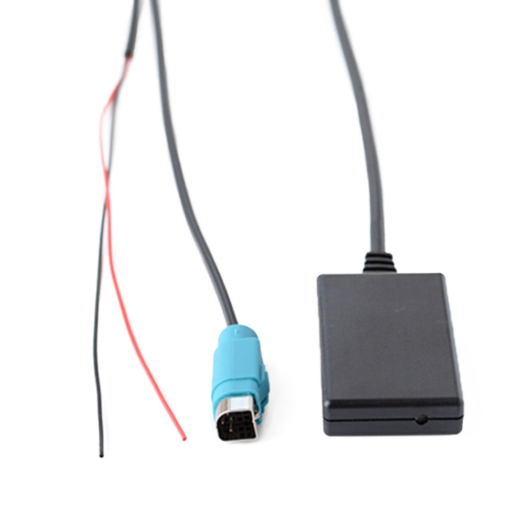 Bluetooth controller with blue plug and red/gray wires, black housing