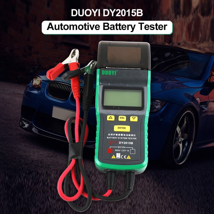 DUOYI DY2015B 12V car battery tester with red and black clamps connected to battery