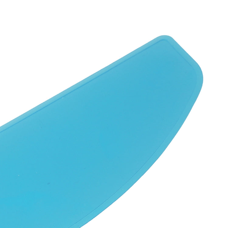 Close-up of blue curved helmet visor anti-fog film