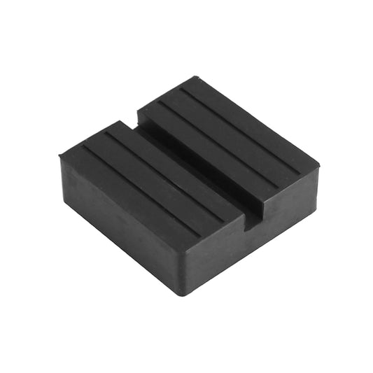 Black rubber car jack support block with ribbed top surface