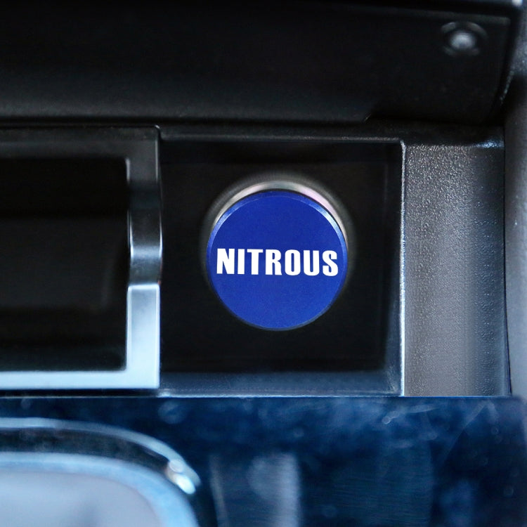 Blue NITROUS metal dust cover installed on a cigarette lighter opening