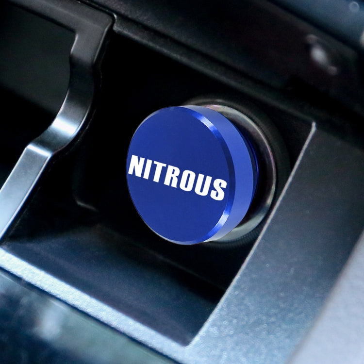 Blue NITROUS metal dust cover cap fitted in a car cigarette lighter slot