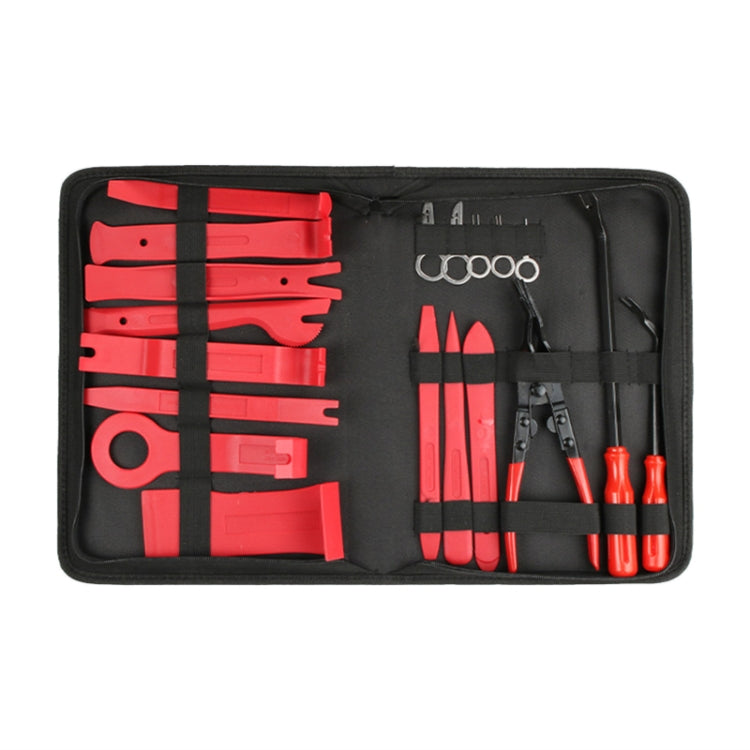 Red car audio tool kit with organized red and black tools in a zippered case