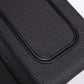 Car trash can lid close-up, black textured plastic with curved slot opening