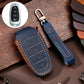 Blue cowhide leather key fob cover with 4-button insert and keyring, orange-stitched trim