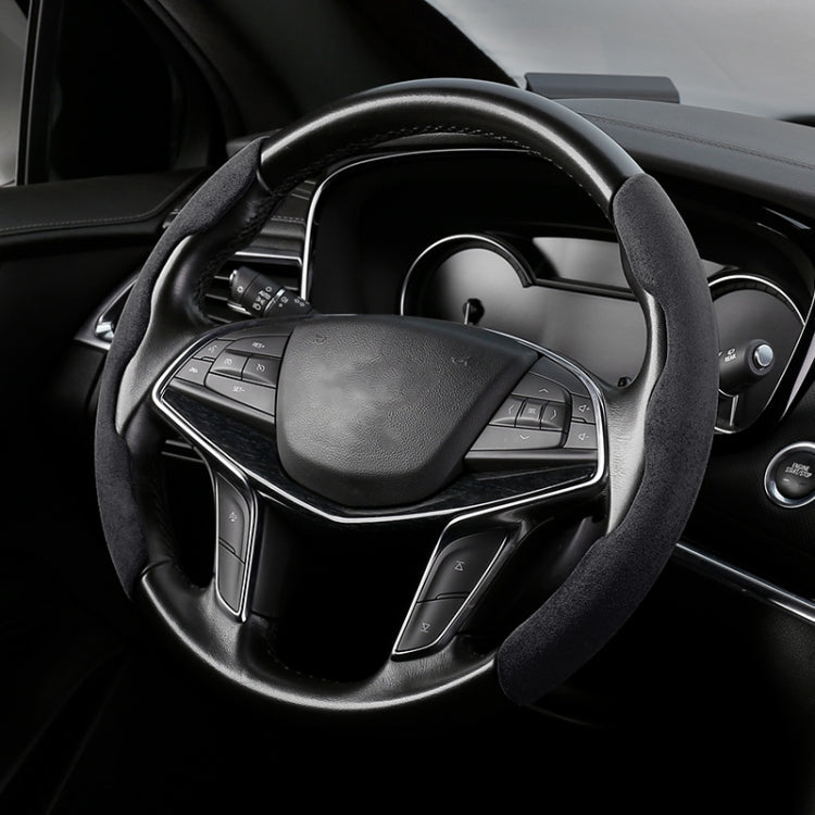 Black suede universal steering wheel cover fitted on a car’s wheel