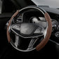 Coffee brown suede universal steering wheel cover fitted on a car’s wheel