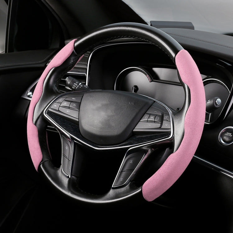 Pink suede universal steering wheel cover fitted on a car’s wheel