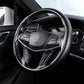 Black carbon-fiber texture steering wheel cover with stitched grip, universal fit.