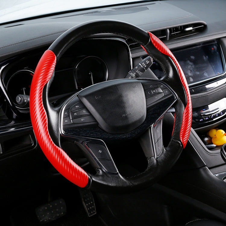 Red carbon-fiber texture steering wheel cover installed, universal fit.