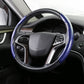 Blue carbon fiber steering wheel cover with black base and stitched grip