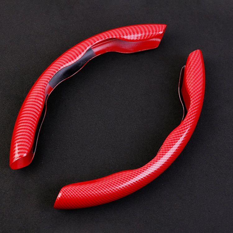 Red carbon fiber steering wheel cover inserts, curved grips shown flat