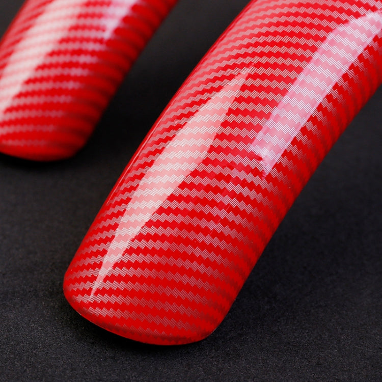 Close-up red carbon fiber steering wheel cover grip with textured weave