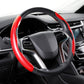 Red carbon fiber steering wheel cover with black base and stitched rim