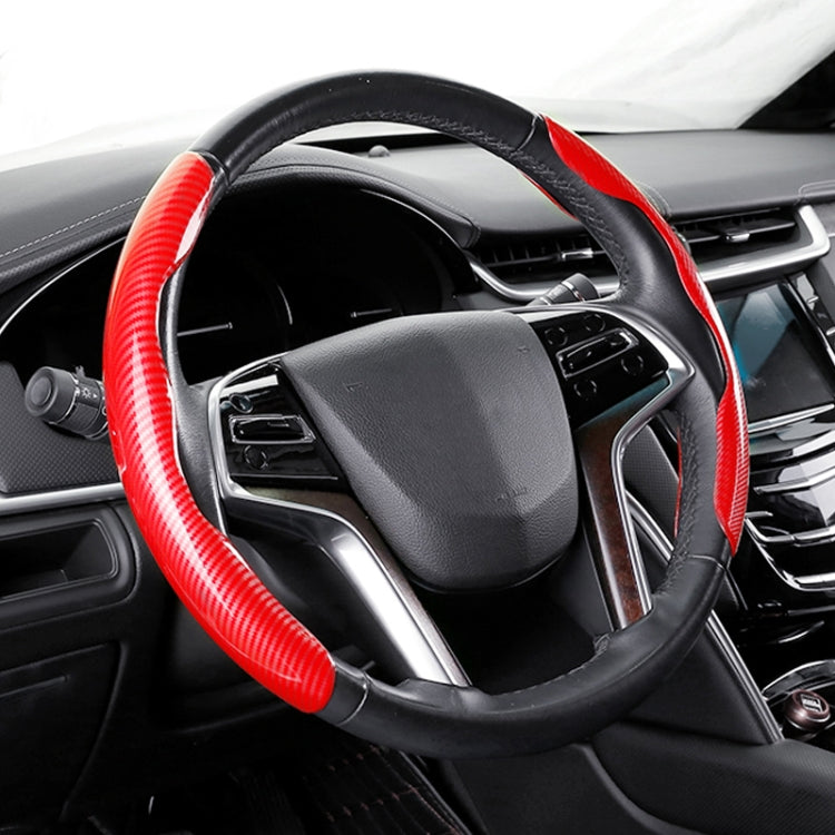 Red carbon fiber steering wheel cover with black base and stitched rim