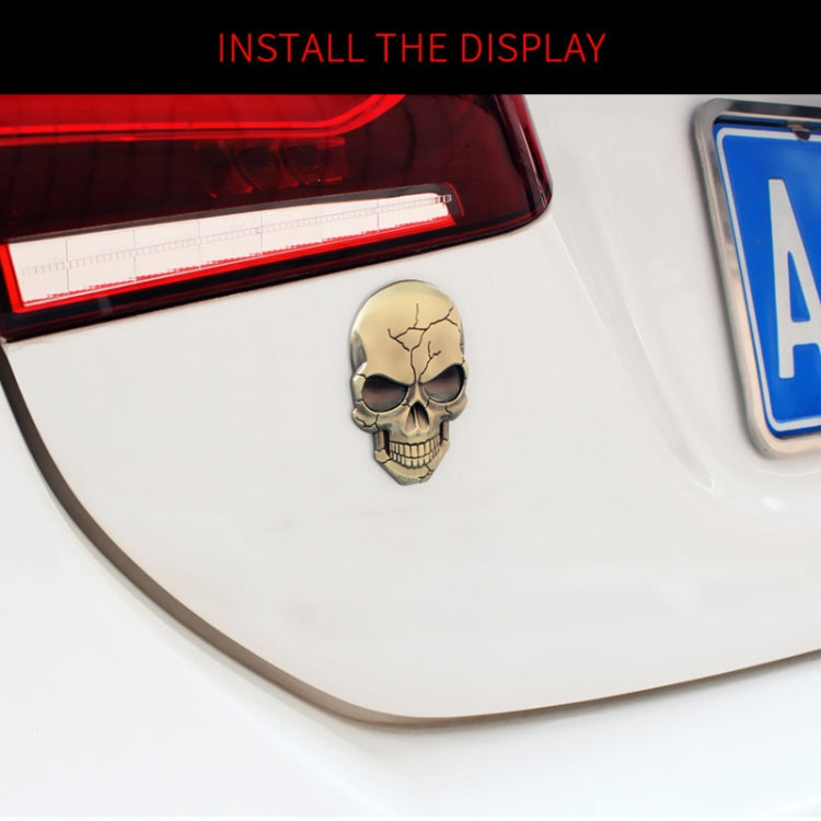 Bronze devil skull emblem car sticker with black sunglasses, mounted on vehicle