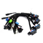 Automotive diagnostic test cable harness with many wire leads and plug terminals, black with blue/green