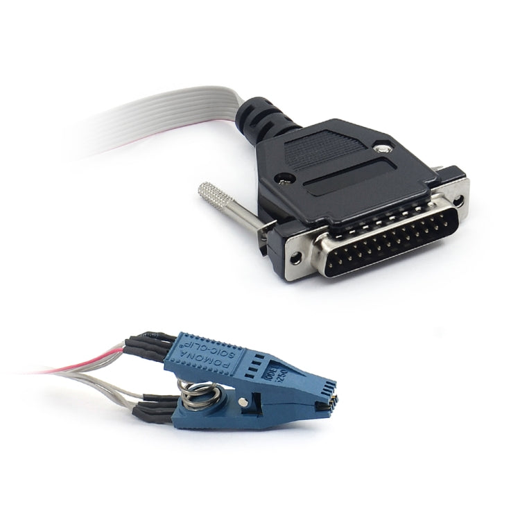 Odometer programmer cable close-up with black multi-pin plug, gray ribbon, and blue module