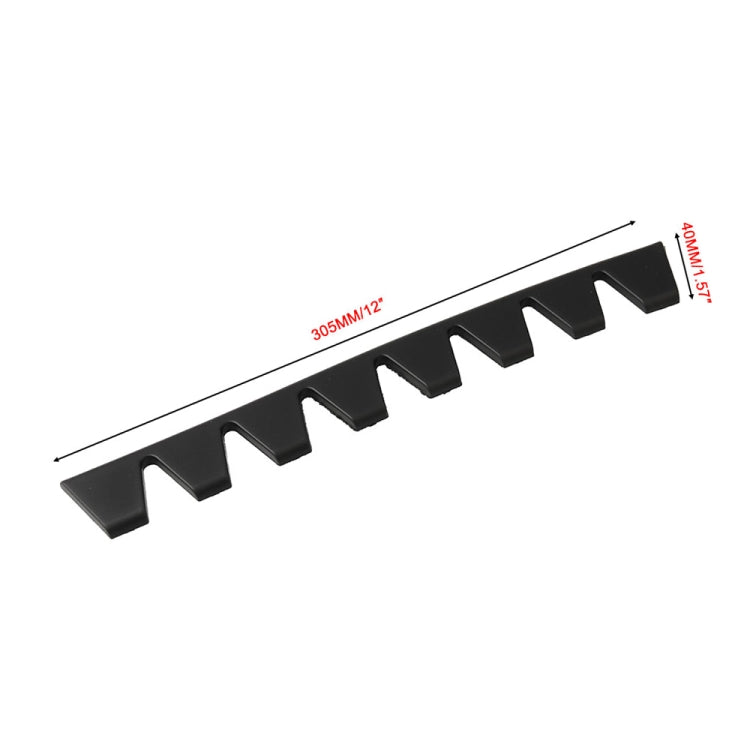 Black bumper guard strip with repeated tooth-shaped protrusions for protection