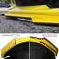 Bumper guard installed on a yellow car front lower edge with serrated teeth