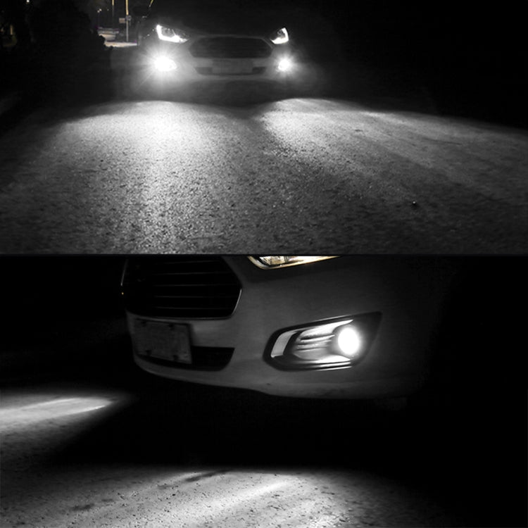Car front with two H3 LED fog lights glowing bright white