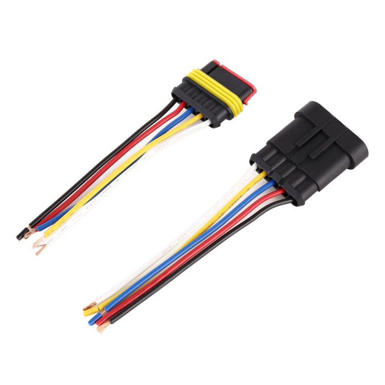 Pair of black 5-pin lamp holders with multicolor wire leads and protective housings