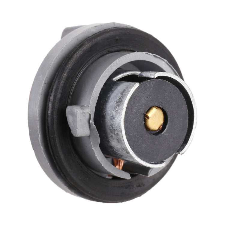 Car reversing/turn light bulb holder with circular black housing and gold contact