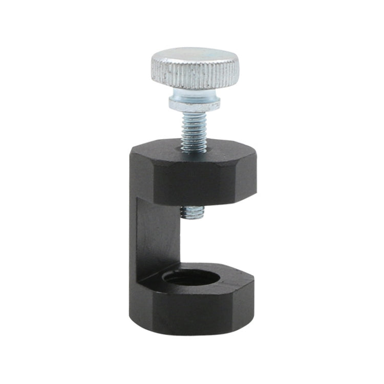Spark plug gap tool with black clamp, knurled top cap, and threaded screw