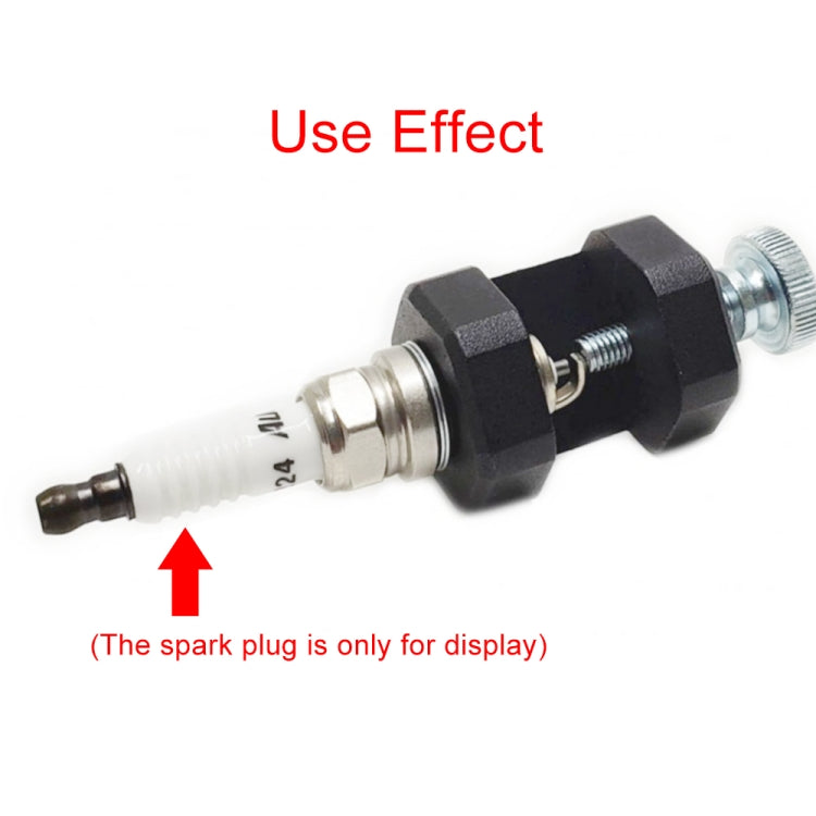 M10 spark plug gap tool showing spark plug held by black clamp