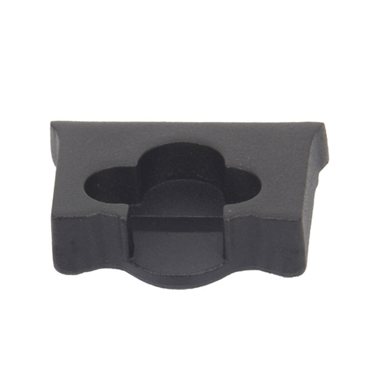 Black rubber tailgate limit block with oval opening in center