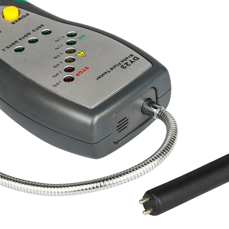 Brake fluid tester probe plug and coiled cable connected to the handheld unit