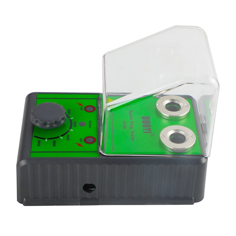 DUOYI spark plug tester with clear hinged cover open, green panel, and dual sockets