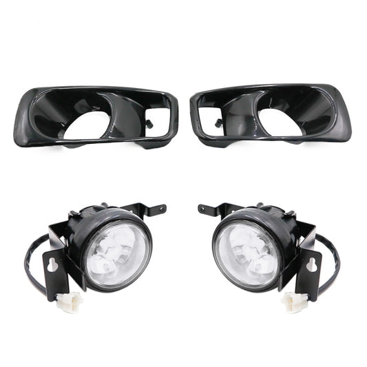 Pair of front fog lamp housings with clear round lenses, black plastic trim