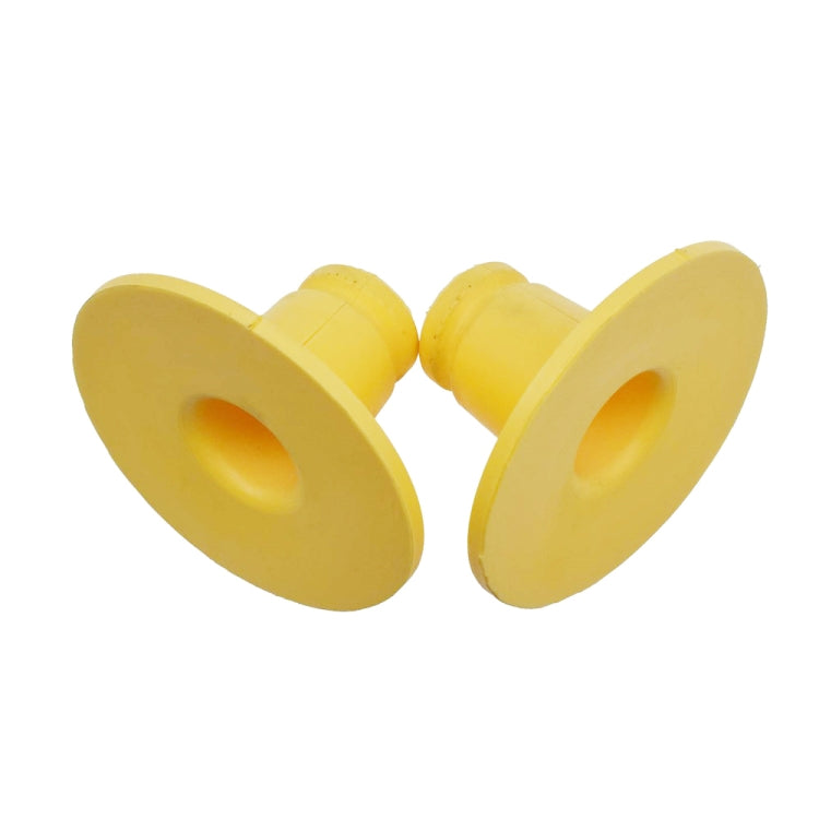 Pair of yellow bump stop absorbers, round flanges with short cylindrical stems
