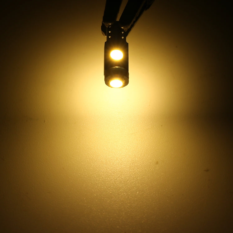 Yellow T5 DC12V instrument panel LED bulb lit in a pair