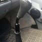 Black quick-curved gear lever extension rod with metal adapter, angled shift handle