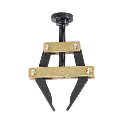 Gold and black roller chain tensioner tool with threaded screw and U-shaped clamps