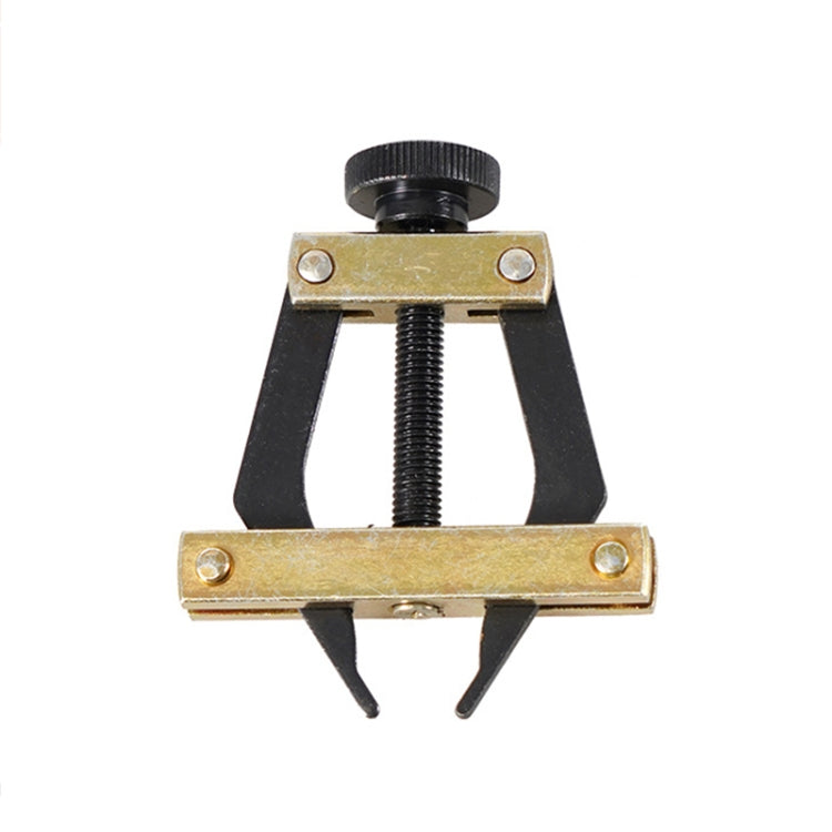 Roller chain tensioner tool with threaded rod, black frame, and gold clamp plates