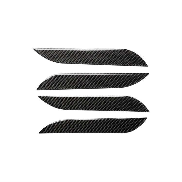 Set of four carbon fiber-look outside door handle decorative stickers, chevron shapes.