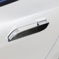 Carbon fiber-look outside door handle sticker applied on white car door.
