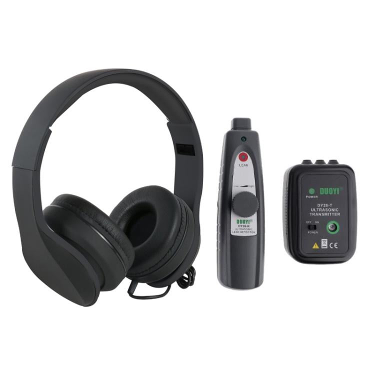 Black over-ear headphones with handheld ultrasonic leak tester and small transmitter module