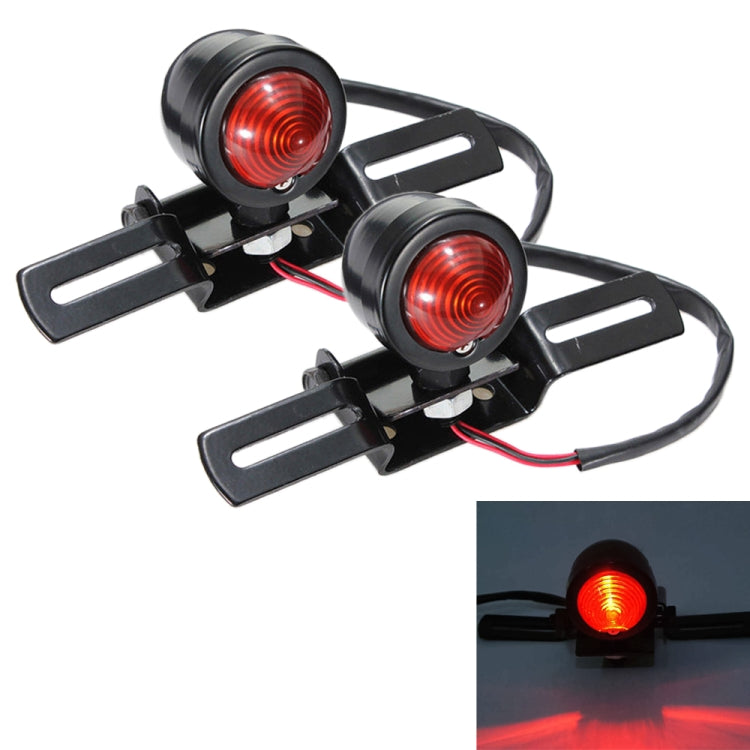 Pair of black motorcycle retro round brake lights with red lenses and mounting brackets