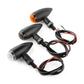 Motorcycle retro turn signal lights set with black housings, clear/amber lenses, and wires