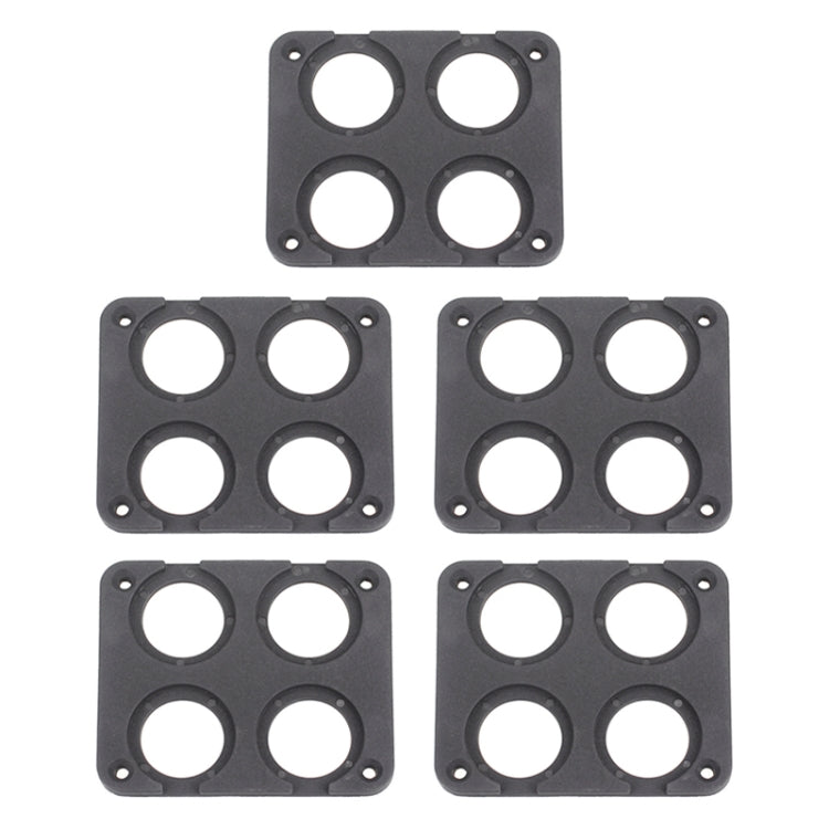 Set of black 4-hole car charging panel inserts with circular openings and mounting holes
